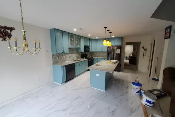Beautiful kitchen with green cabinets